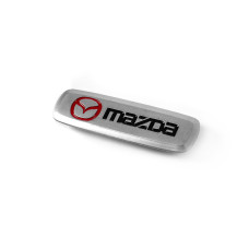 Шильдик алюмінієвий для килимків (1шт) для Mazda